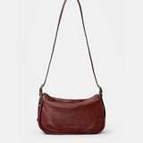 Bolso de mano en piel burdeos