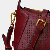Bolso de mano en piel troquelada burdeos