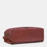 Burgundy suede crossbody bag.
