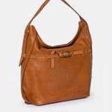 Schultertasche aus cognacfarbenem Leder.