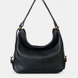 Multifunktionale schwarze Ledertasche.