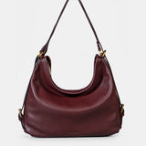 Bolso multifuncional en piel burdeos