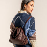 Bolso multifuncional en piel burdeos