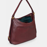 Bolso multifuncional en piel burdeos