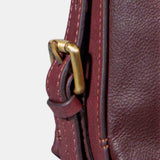 Bolso multifuncional en piel burdeos