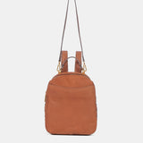 Rucksack aus cognacfarbenem Veloursleder.