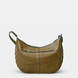 Schultertasche aus grünem Wildleder.