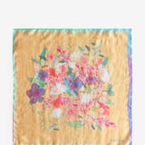 Women's silk bandana with floral print in orange