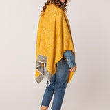Poncho de mujer estampado en ámbar