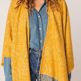 Poncho de mujer estampado en ámbar