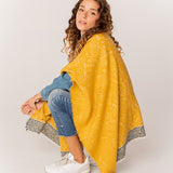 Poncho de mujer estampado en ámbar
