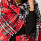 Reversible women's poncho in red and blue