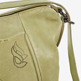 Women's backpack bag in green die-cut leather