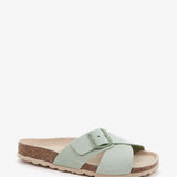 Women's flat sandal with buckle in green