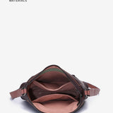 Shoulder bag in burgundy recycled materials