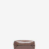 Patent leather handbag in taupe