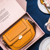 Shoulder bag in recycled materials amber