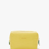 Large yellow leather toiletry bag