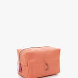 Large orange leather toiletry bag