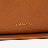 Shoulder bag in cognac recycled materials