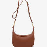 Crossbody bag with tassel in cognac recycled materials