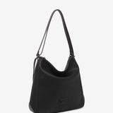 Schwarz, Rucksack-Tasche aus recycelten Materialien.