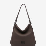 Braune Tasche-Rucksack aus recycelten Materialien.