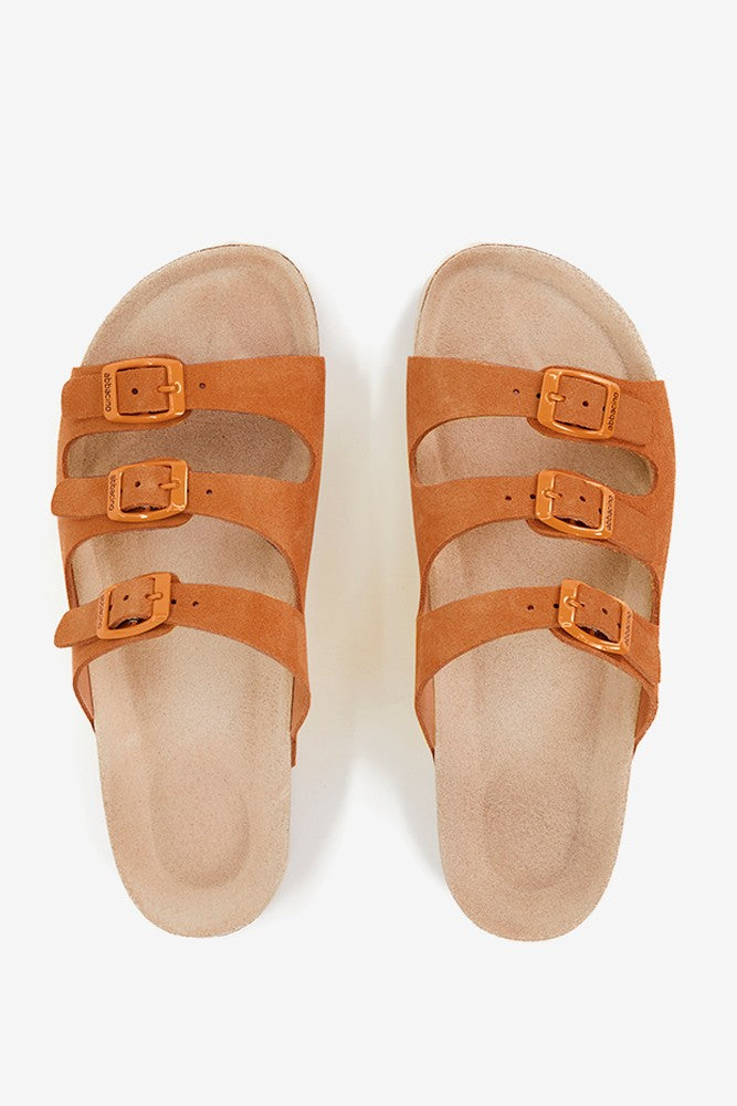 Women's flat leather sandal with triple buckle in cognac