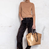 Shopper-Tasche aus goldenem Leder.