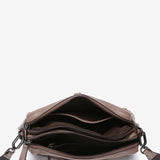 Tasche aus Leder und Wildleder in Taupe.