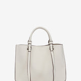 White die-cut handbag made from recycled materials