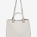 White die-cut handbag made from recycled materials