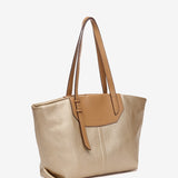 Shopper-Tasche aus recycelten Materialien in Gold.