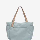 Shopper-Tasche aus recycelten und gepolsterten Materialien in Blau.