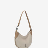 Kleine Schultertasche aus beige Leder.