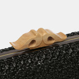 Black braided clutch