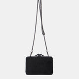 Clutch de fiesta en terciopelo negro