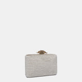 Partytasche aus beigem Samt.