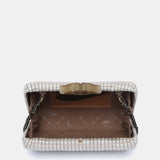 Partytasche aus beigem Samt.