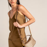 Handtasche in Goldfarben.