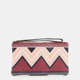 Neceser de mujer con print geométrico en burdeos