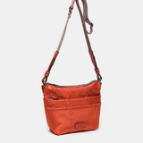 Organizer aus recyceltem orangefarbenem Material.