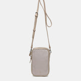 Handytasche aus recycelten Materialien in Beige.