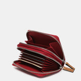 Kleine Geldbörse aus rot-bicolor Leder.