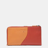 Large leather wallet in coral tones