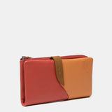 Large leather wallet in coral tones
