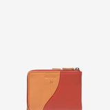 Small leather wallet in coral tones