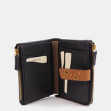 Cartera pequeña en piel negra