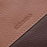 Cartera pequeña en piel bicolor burdeos
