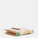 Tarjetero en piel con estampado ámbar